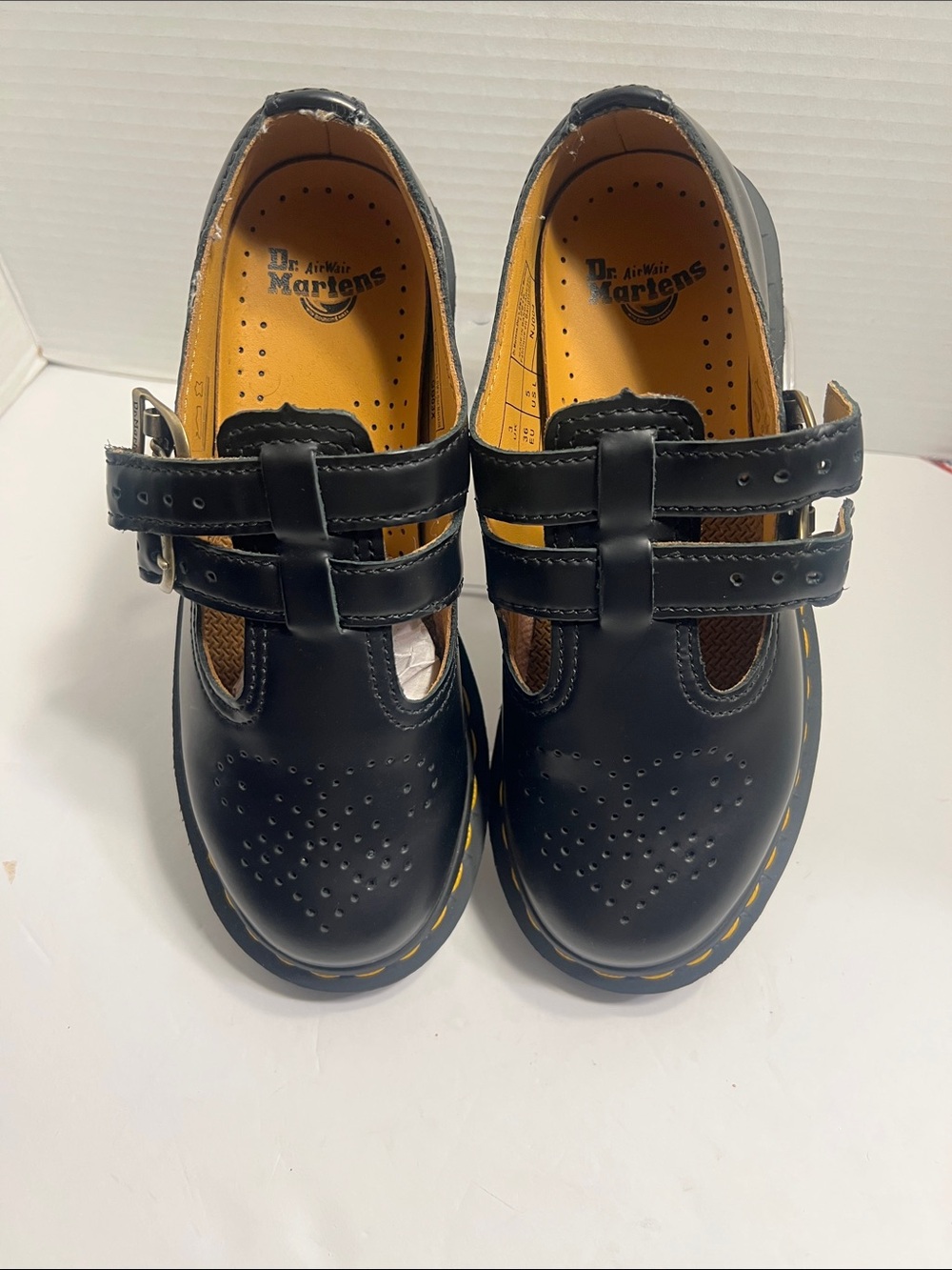 Dr. Martens Kids Black T-Strap Mary Jane Shoes with Yellow Stitching